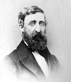 an old black and white photo of a man with a beard