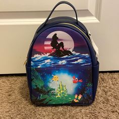 New With Tags Never Used. Smoke Free Pet Free Home. Open To Offers. Flounder And Sebastian, Ariel Silhouette, Mermaid Backpack, Disney The Little Mermaid, Little Mermaid Ariel, Disney Princess Ariel, Loungefly Bag, Disney Bag, Women Leather Backpack