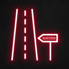 a red neon sign that says success and an arrow pointing to the right on a black background