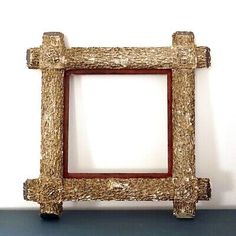 a wooden frame sitting on top of a table