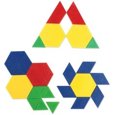 three different shapes made out of colored construction paper on a white surface with one triangle, the other hexagon and an arrow