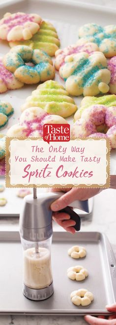 a person is making some cookies on a cookie sheet with a sign that says the best way you should make tasty spritz cookies