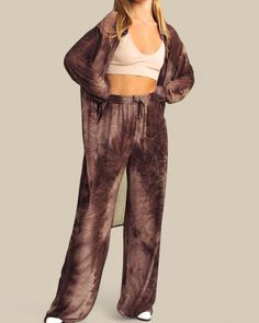 Unwind in effortless style with the Mocha Dreams 2 piece Shirt and Pants set, a perfect blend of comfort and sophistication. This two-piece set features a lightweight, tie-dye duster and matching wide-leg pants, ideal for layering over your favorite crop top or bralette. The rich mocha hues and relaxed fit make it versatile for lounging at home or running errands in style. Embrace cozy-chic vibes with this set that transitions seamlessly from morning coffee runs to evening unwinds. Style Tip: Pa Shirt And Pants Set, Chic Vibes, Cozy Chic, Kimono Dress, Vanuatu, Shirt And Pants, Guinea Bissau, Mozambique, Trinidad