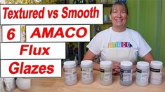 a woman is standing in front of six jars of paint with the words textured vs smooth 6 amoco flux glazes