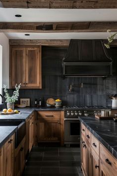 a kitchen with wooden cabinets and black counter tops