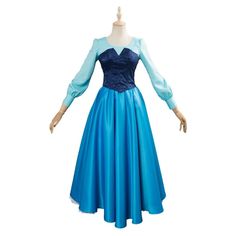 a blue dress on a mannequin with long sleeves