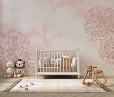 a baby's room with flowers painted on the wall and teddy bears sitting next to it