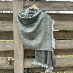 These are alpaca shawls made in the highlands of Ecuador. We love them for the softness and warm material. These are 70% alpaca, and they use poliéster to structure it. You can wash them cold water with soft cleaners if not just water, and you could brush them to get the hair in the same direction. Perfect for fall spring and winter.  Size is 70 in x25 in Cozy Alpaca Shawl Scarf, Fall Handwoven Alpaca Shawl, Alpaca Wrap Scarf One Size, Winter Alpaca Shawl, Alpaca Shawl For Winter, Cozy Alpaca Shawl One Size, Handwoven Alpaca Winter Scarf, One Size Alpaca Scarves For Fall, Handwoven Alpaca Scarves For Winter