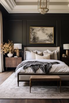 a bedroom with black walls and white bedding