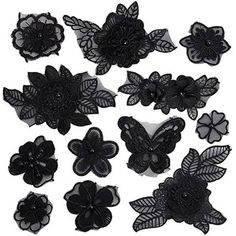 black lace appliques with flowers and leaves on white background, set of 12 pieces