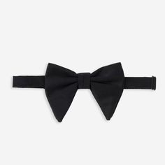 Classic, timeless and perfect for any formal evening. Choose our black satin bow tie and introduce yourself as Bond, James Bond. | Men's Tie Bar: Solid Satin Bow Tie - Pre-Tied - Regular, In Black, Silk Elegant Evening Suit And Tie Accessories, Elegant Black Tuxedo For Black Tie, Classic Black Tuxedo For Party, Classic Black Suit And Tie Accessories, Classic Black Party Tuxedo, Black Fitted Tuxedo Dapper Style, Classic Fitted Black Suit And Tie Accessories, Black Fitted Tuxedo In Dapper Style, Tailored Black Suit And Tie Accessories For Party