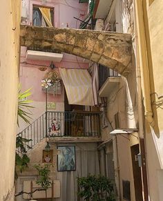 a narrow alleyway in an old european city