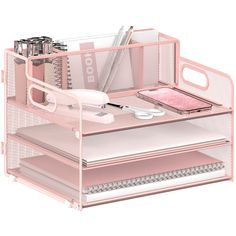 a pink desk organizer with two drawers and various items on it, including pens, pencils, scissors, and other office supplies