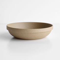 a white bowl sitting on top of a table