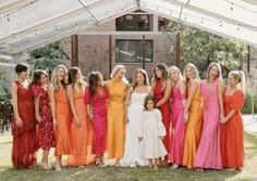 a group of women standing next to each other