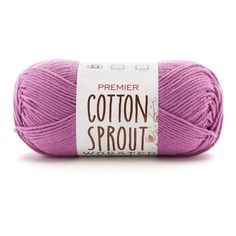 a ball of cotton sprout yarn in pink, on a white background with the label