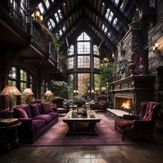 a living room filled with furniture and a fire place in the middle of an open floor plan