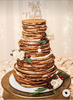 a wedding cake made out of cookies and flowers