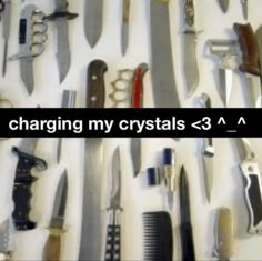 there are many different types of knives and combs on the table with text that reads, charging my crystals - 3 a m