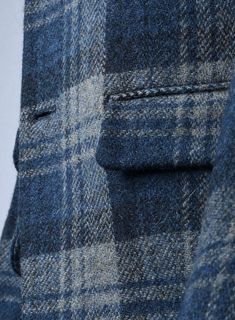 Make brilliant modernity in your fashion with additional flawlessness in your tweed collection. Tailored with pure wool fabric, our Harris Tweed Blue Tartan Jacket is woven in a checks pattern with various shades of fresh and crisp blue color that shows clear signs of prosperity in your look. In addition, this custom-made piece is a great partner for your winter celebrations or casual work wear, which will spruce up your appearance. So wear our fabulous piece that presents itself with a bounty o Plaid Tweed Outerwear With Welt Pockets, Blue Tailored Tweed Outerwear, Tailored Blue Tweed Outerwear, Blue Tweed Blazer With Notch Lapel, Timeless Plaid Wool Outerwear, Blue Tweed Jacket With Welt Pockets, Blue Tweed Jacket With Notch Lapel, Tailored Blue Wool Tweed Jacket, Plaid Wool Tweed Jacket For Tailoring