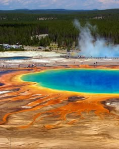 the grand prismatic spring, wyoming, usa is shown in two different pictures with text overlaying it