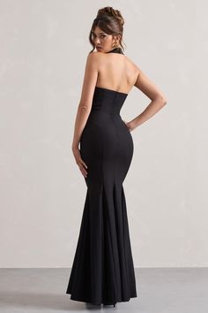 Make an statement at your next black tie occasion in Plaza. This black maxi dress has been cut in a premium crepe that hugs and sculpts your figure, Plaza boasta bold plunging neckline with halter straps. Style this fishtail maxi with a tousled bun and some gold earrings to let the dress do this talking. Features - Premium crepe- Halter neck- Plunge neckline- Sleeveless - Invisible zip closure - Fishtail hem- Maxi length Sizing & Fit Model is 5'7" and wears UK size 8 / US size 4Product Information Designed exclusively by Club L London Fully lined with no stretch Premium crepe in Black (86% Polyamide, 14% Elastane) 157cm total length SKU: CL131105002 Fishtail Maxi Dress, Leonie Hanne, Club L London, Christmas Party Dress, Plunge Neckline, Information Design, Invisible Zip, Black Maxi, Plunging Neckline