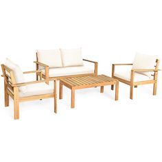 a set of wooden furniture with white cushions