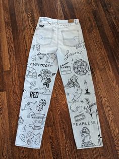 Eras Tour Jeans Diy, Art Pants Ideas, Eras Tour Painted Jeans, Taylor Swift Painted Jeans, Taylor Swift Arts And Crafts, Eras Tour Pants, Eras Tour Painting