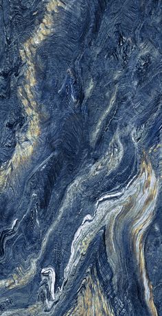 blue and yellow swirled marbled paper with white swirls