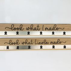 two wooden signs that say look what i made and look what i'm made