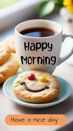 a cup of coffee and cookies on a table with the words happy morning have a nice day