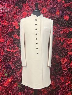 This Pale Peach Embroidered Sherwani from Vama Designs combines elegance and tradition, perfect for weddings and festive occasions. Available in sizes 38-42, with customization available for other sizes (3-6 weeks). Personalize your look with customizable dupatta, mojari shoes, safa (pagri), and jewelry. Visit our Fremont Bay Area store to explore more. Key Features: Elegant pale peach embroidered sherwani. Sizes: 38-42; customization available (3-6 weeks). Customizable dupatta, shoes, safa, and Formal Beige Sherwani With Chikankari Embroidery, Fitted Beige Sherwani With Chikankari Embroidery, Designer Fitted Cream Sherwani, Designer Fitted Beige Nehru Jacket, Designer Fitted Pink Sherwani, Fitted Beige Embroidered Sherwani, Cream Fitted Long Sherwani, Formal Cream Sherwani With Dabka Work, Fitted Cream Sherwani With Dabka Details