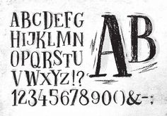 an old fashioned alphabet with black ink