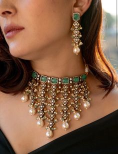 Enhance your traditional attire with this Stunning Choker necklace set. This intricate piece is encrusted with polkis and cubic zirconia, complemented by mint flourite stones for a touch of elegance. The trinkets of pearls and mint onyx add a classic touch. Complete the set with the matching earrings for a stunning traditional statement look.  Necklace Closure - Adjustable Dori Earrings Closure - Push Back  A feeling more than just material pleasures, our range of everyday jewels is like a ritua Pearl Bridal Jewelry Sets, Sabyasachi Designer, Sabyasachi Mukherjee, Jewelry For Wedding, Necklace Closure, Choker Necklace Designs, Choker Designs, Polki Necklace, Antique Jewelry Indian