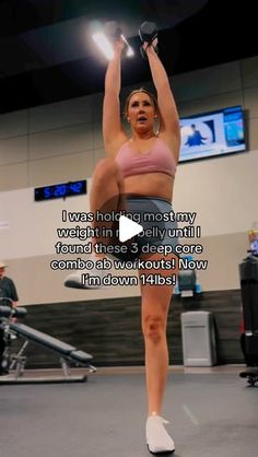 a woman is doing exercises in the gym