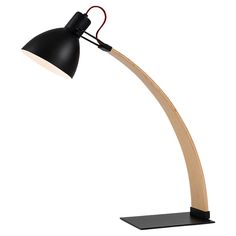 a black and wooden desk lamp on a white background