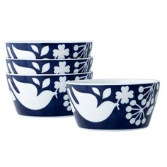 three blue and white bowls sitting next to each other