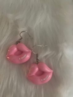 Description Embrace your love for unique accessories with these Pink Lips Wire Earrings from Alien Bratz! These quirky earrings feature hypoallergenic posts and are made with lightweight resin. Perfect for adding a playful touch to any outfit, they make a great Valentine's Day gift. (Only available while supplies last!) Details Resin Pink puckering Lips lightweight waterproof and very durable hypoallergenic posts Features One of a kind, fashion jewelry, everyday jewelry Great gift for that speci Lip Earrings, Jewelry Everyday, Quirky Earrings, Unique Accessories, Wire Earrings, Pink Lips, Everyday Jewelry, Accessories Unique, Valentine Day Gifts