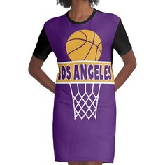 Loose and casual fit jersey t-shirt dress. Printed polyester blend front panel, solid color 100% cotton back/sleeves/rib. Size range XS-2XL. Los Angeles Sports Basketball, Casual Fits, Angeles, T Shirt Dress, Dresses For Sale, Graphic Tshirt, Shirt Dress, Solid Color, T Shirt