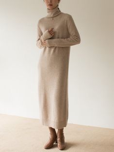 Luxury Cozy Merino Wool Turtleneck, Luxury Cozy Fine Knit Turtleneck, Luxury Merino Wool Cozy Turtleneck, Luxury Merino Wool Turtleneck, Luxury Turtleneck Fall Dresses, Luxury Elegant Turtleneck Midi Dress, Luxury Wool Midi-length Dresses, Luxury High Neck Merino Wool Turtleneck, Luxury Turtleneck Dress For Work