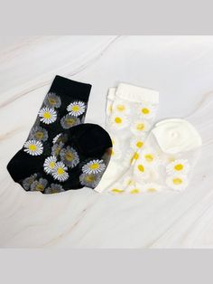 The Daisy Field Sheer Socks Set Of 2 Pairs are a must-have for flower lovers. These adorable socks feature a charming daisy design, adding a touch of whimsical style to any outfit. Made with a sheer material, they're both stylish and lightweight. Material: 60% Cotton, 35% Polyester, 5% Spandex One size, fits US shoe size 5-9.5 Swim Jewelry, Daisy Field, Whimsical Style, Sheer Socks, Daisy Design, School Games, Whimsical Fashion, Sheer Material, Southern Charm