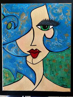 a painting of a woman's face with blue hair and green eyes is shown