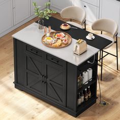 a kitchen island with food and drinks on it