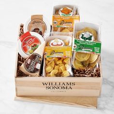 a wooden box filled with different types of food