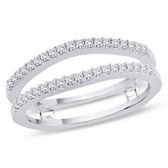 two white gold wedding bands with round diamonds on each band, set in 18k white gold