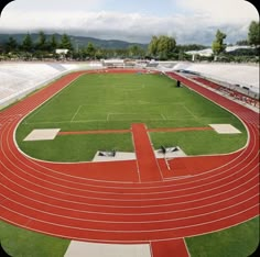 an aerial view of a track in a stadium