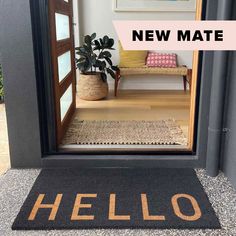 a door mat with the words hello written on it