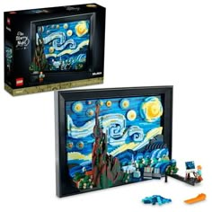 two legos are shown in front of a box with an image of the starry night