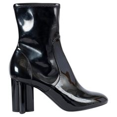 100% authentic Louis Vuitton Instinct rounded toe mid-calf boots in black patent leather featuring glossy black heel shaped like the classic quatrefoil flower. Open with a zipper on the inside. Brand new. Come with dust bags. Measurements Imprinted Size 39 Shoe Size 39 Inside Sole 26cm (10.1in) Width 7.5cm (2.9in) Heel 8cm (3.1in) All our listings include only the listed item unless otherwise specified in the description above. Mid Calf Boots, Black Patent Leather, Authentic Louis Vuitton, Black Heels, Mid Calf, Patent Leather, Clothing And Shoes, Christian Louboutin, Ankle Boots