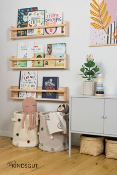 there are books and toys on the shelves in this child's playroom,